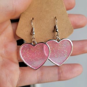 Pink glow in the dark earrings